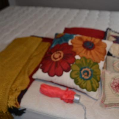 LOT 526 THROW PILLOWS, TWO THROWS AND UMBRELLA