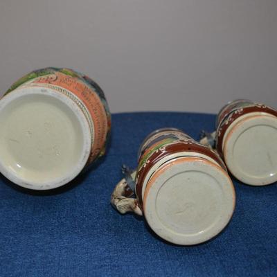 LOT 546. THREE VINTAGE STEINS MADE IN GERMANY