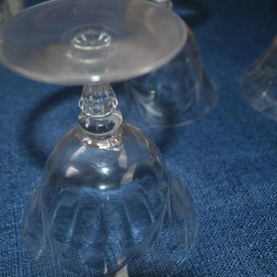 LOT 545 CRYSTAL GLASSES AND TWO DECANTERS