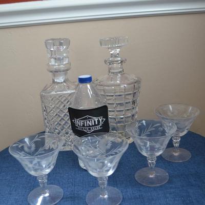 LOT 545 CRYSTAL GLASSES AND TWO DECANTERS