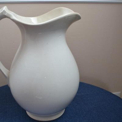 LOT 554 CERAMIC PITCHER