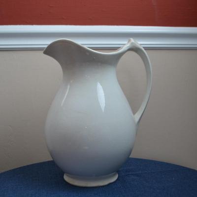LOT 554 CERAMIC PITCHER