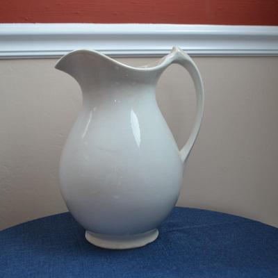 LOT 554 CERAMIC PITCHER