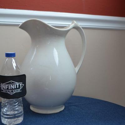 LOT 554 CERAMIC PITCHER