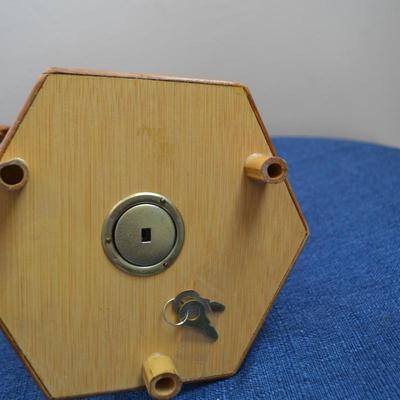 LOT 562. VINTAGE WINDMILL MUSIC BOX BANK