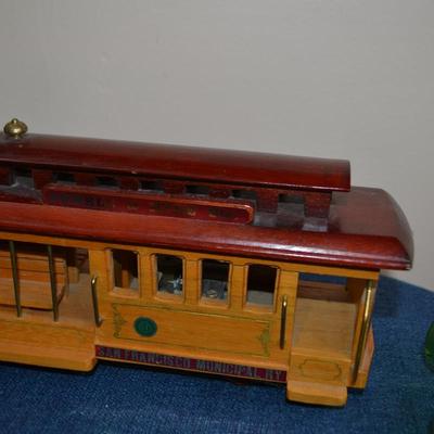 LOT 563. HOME DECOR ITEMS AND TROLLEY MUSIC BOX
