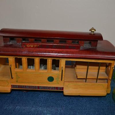 LOT 563. HOME DECOR ITEMS AND TROLLEY MUSIC BOX