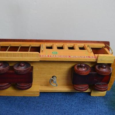 LOT 563. HOME DECOR ITEMS AND TROLLEY MUSIC BOX