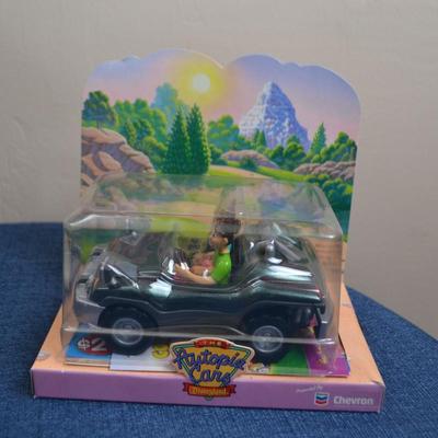 LOT 573. VINTAGE RUBBER SNOOPY AND CHEVRON CAR