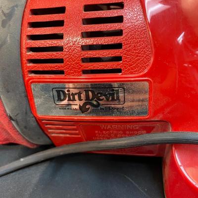 Pair of Dirt Devil Hand Vacs Working with Accessories