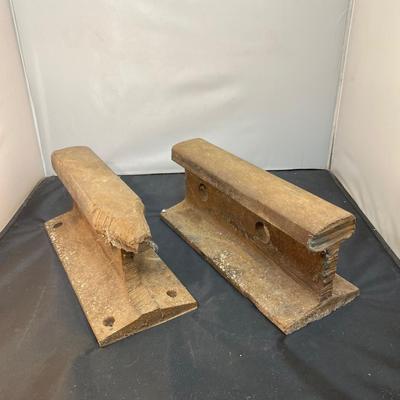 Pair of Vintage Heavy Solid Iron Curved Anvils from Railroad Track