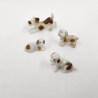 VINTAGE CERAMIC JAPANESE FAMILY OF CUTE DOG FIGURINES