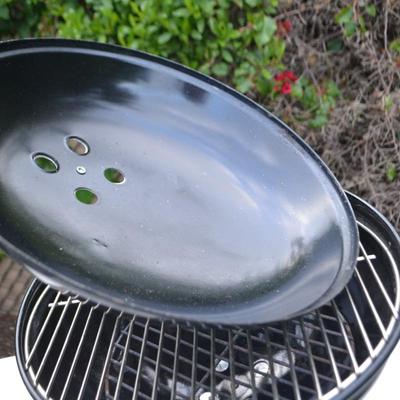 LOT 597. TABLE TOP WEBER GRILL