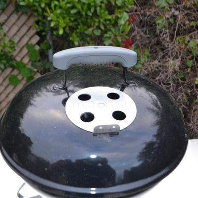 LOT 597. TABLE TOP WEBER GRILL