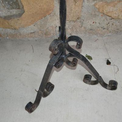 LOT 601. 41" TALL WROUGHT IRON CANDLE HOLDER