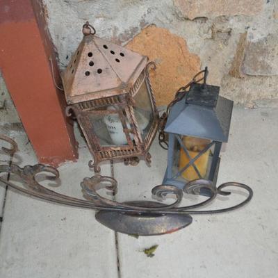 LOT 602. YARD DECOR CANDLE HOLDERS