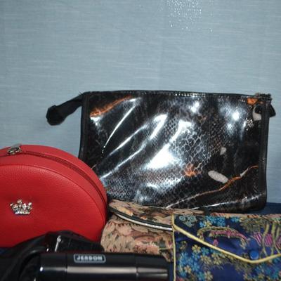 LOT 614. COLLECTION OF COSMETIC BAGS