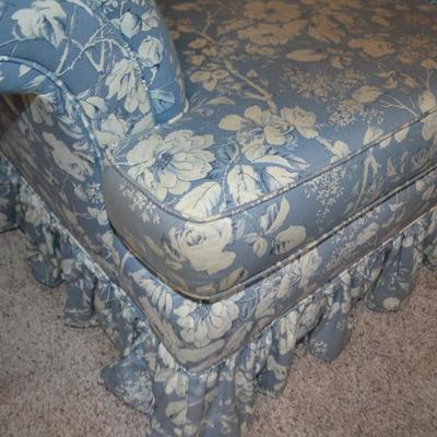 LOT 627.   BLUE FLORAL PRINT LOVESEAT