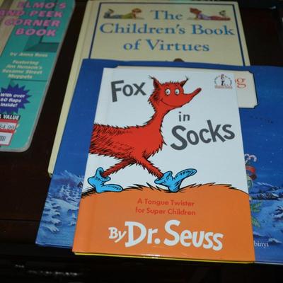 LOT 631.  ELEVEN KIDS BOOKS AND ONE PUZZLE