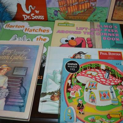 LOT 631.  ELEVEN KIDS BOOKS AND ONE PUZZLE