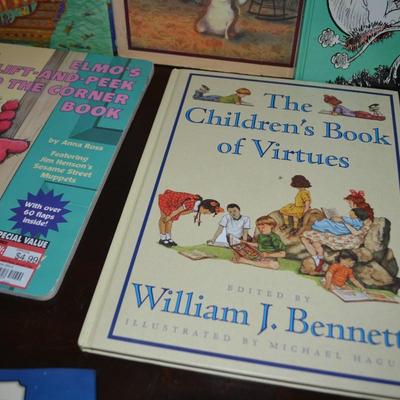 LOT 631.  ELEVEN KIDS BOOKS AND ONE PUZZLE