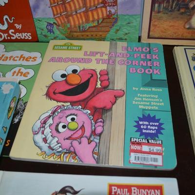LOT 631.  ELEVEN KIDS BOOKS AND ONE PUZZLE