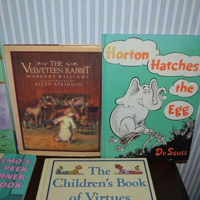 LOT 631.  ELEVEN KIDS BOOKS AND ONE PUZZLE