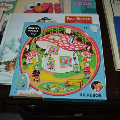 LOT 631.  ELEVEN KIDS BOOKS AND ONE PUZZLE
