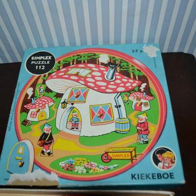 LOT 631.  ELEVEN KIDS BOOKS AND ONE PUZZLE