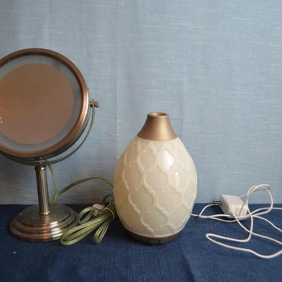LOT 637. LIGHTED MIRROR AND AROMA  MACHINE