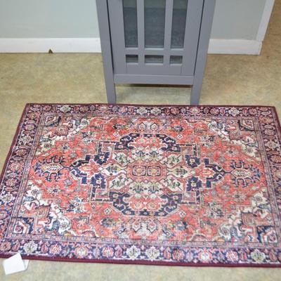 LOT 662:   CABINET AND FLOOR MAT (LOOK A LIKE SILK RUG)