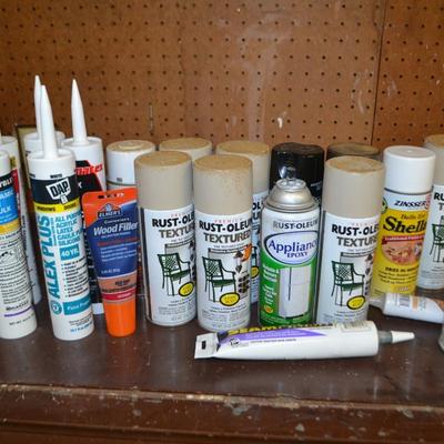 LOT 667 SPRAY PAINT AND LATEX CAULK