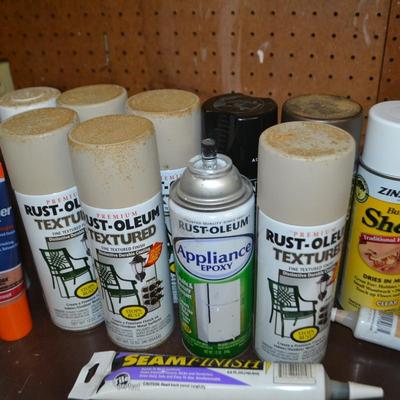 LOT 667 SPRAY PAINT AND LATEX CAULK