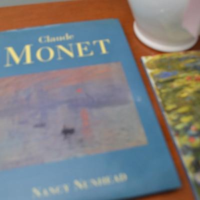 LOT 670. HOME DECOR AND TWO MONET BOOKS