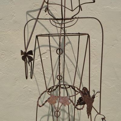 LOT 690. WIRE WOMAN YARD ART WOMAN WITH UMBRELLA