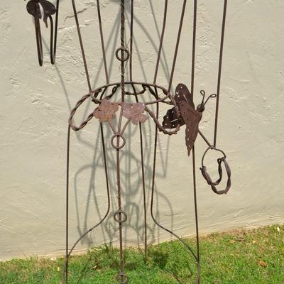 LOT 690. WIRE WOMAN YARD ART WOMAN WITH UMBRELLA