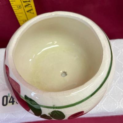 Small floral bowl with small hole in the bottom