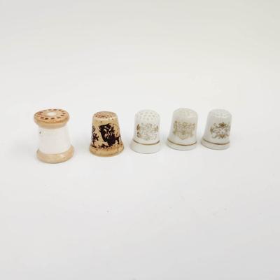VINTAGE PORCELAIN THIMBLE SET OF 4