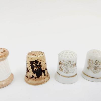 VINTAGE PORCELAIN THIMBLE SET OF 4