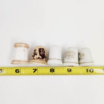 VINTAGE PORCELAIN THIMBLE SET OF 4
