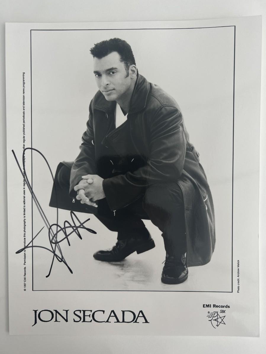 Secada Face Jon Secada signed photo | EstateSales.org