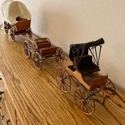 Covered Wagon And Two Buggies