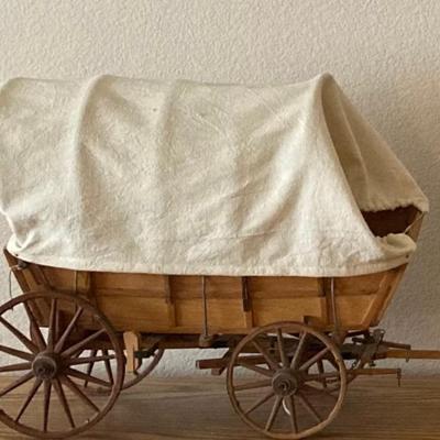 Covered Wagon And Two Buggies