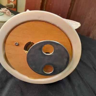 Porcelain dove musical figure with two porcelain ENESCO ring boxes and a candle holder