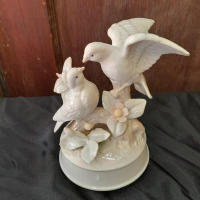 Porcelain dove musical figure with two porcelain ENESCO ring boxes and a candle holder