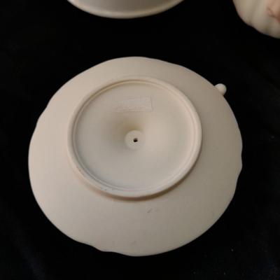 Porcelain dove musical figure with two porcelain ENESCO ring boxes and a candle holder