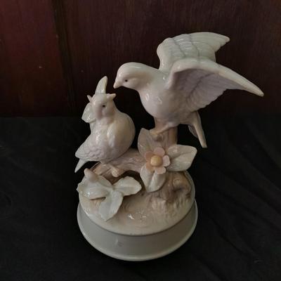 Porcelain dove musical figure with two porcelain ENESCO ring boxes and a candle holder