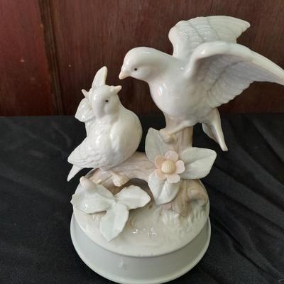 Porcelain dove musical figure with two porcelain ENESCO ring boxes and a candle holder