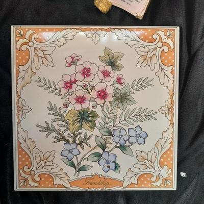 Friendship faux book, floral trivet, old glory picture frame and small wall hanging