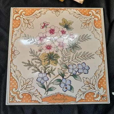 Friendship faux book, floral trivet, old glory picture frame and small wall hanging